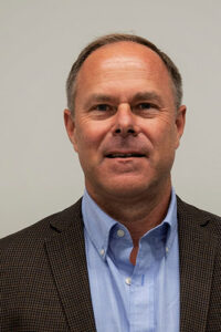 headshot of frizzi