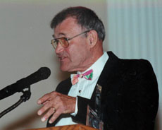 man standing at a podium